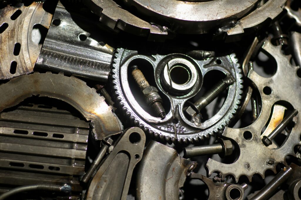 A close-up view of a jumble of gears and sprockets